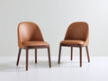 Sillas de comedor tapizadas de cuero sintético y madera 56x58x82 cm - marrón - estilo moderno con respaldo envolvente